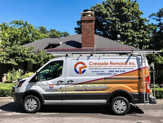 Suffield Chimney Sweep technician removing creosote safely in Suffield, CT
